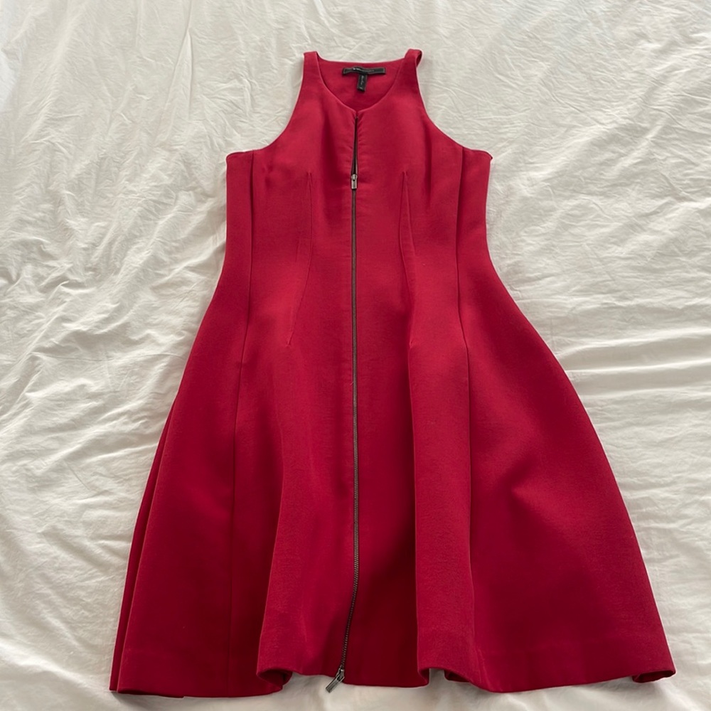 Little tight red dress.